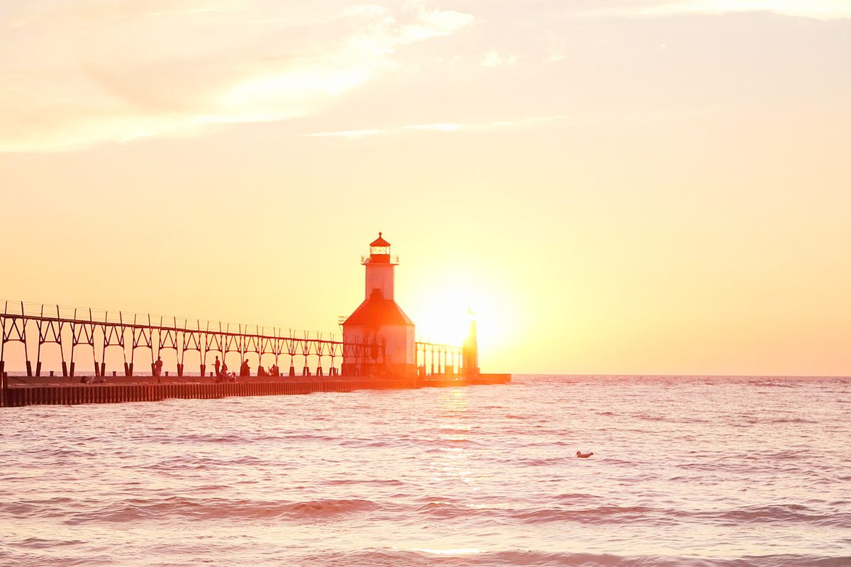 Stunning sunset over Lake Michigan pier near New Buffalo, Michigan